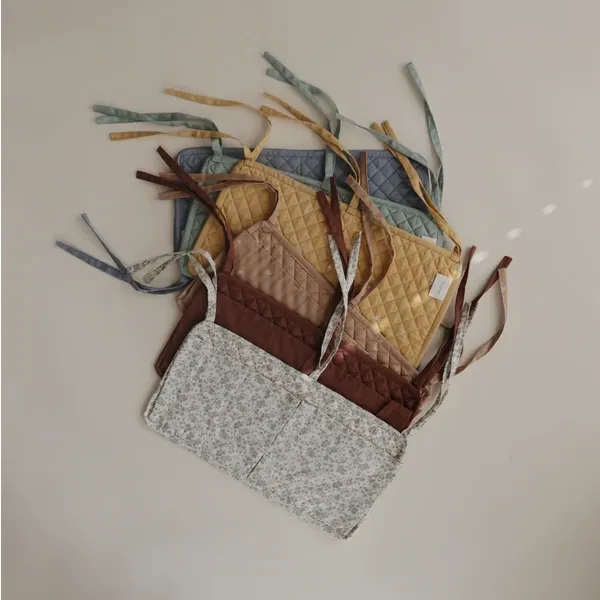 Mushie Crib Pocket | Sun