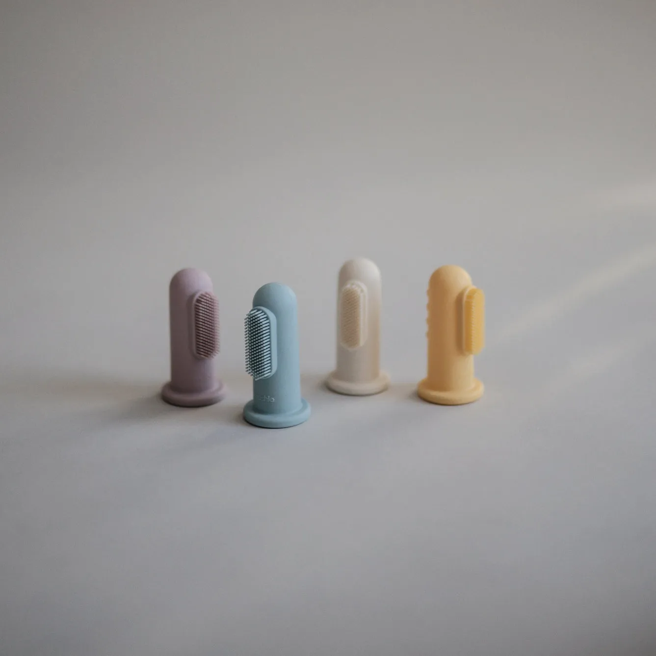 Mushie Toothbrush Finger | Soft Lilac   Ivory